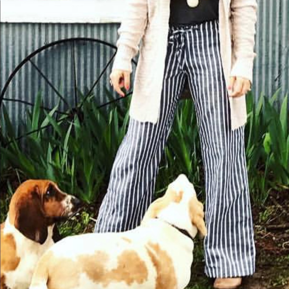 Navy and White striped bell bottom pants.